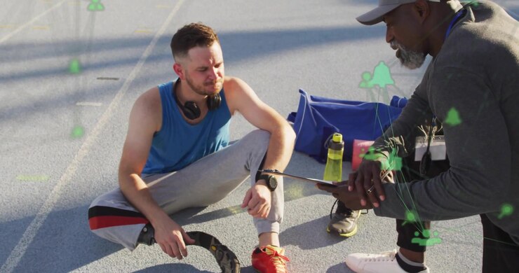 Runner checking smartwatch while adjusting running blade noting coach cues and logging sports data