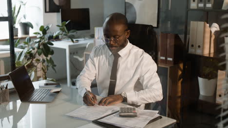 businessman working on documents in office
