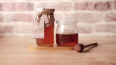 honey in glass jars with craft packaging