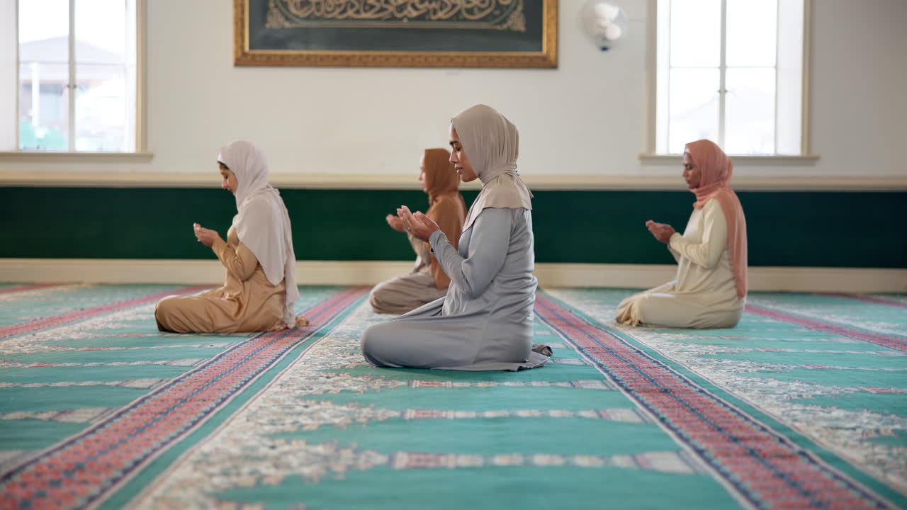 Muslim women praying in a mosque