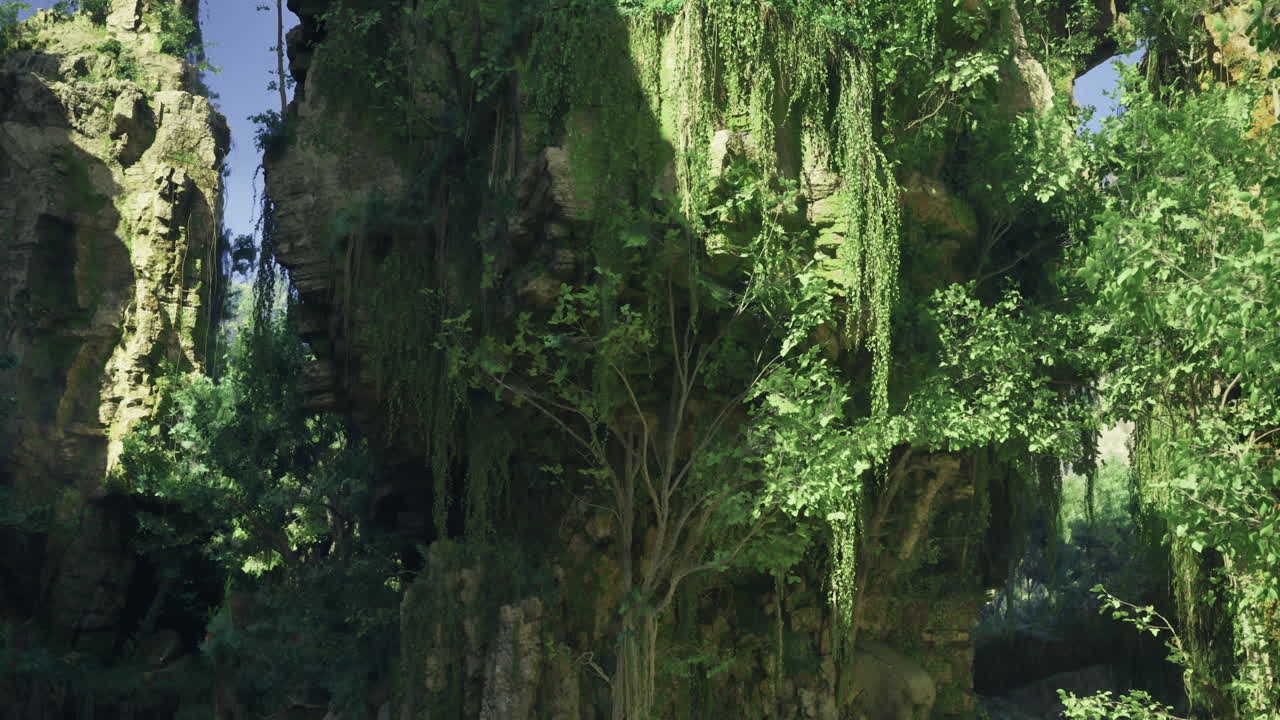 Lush greenery envelops towering cliffs in a serene natural landscape