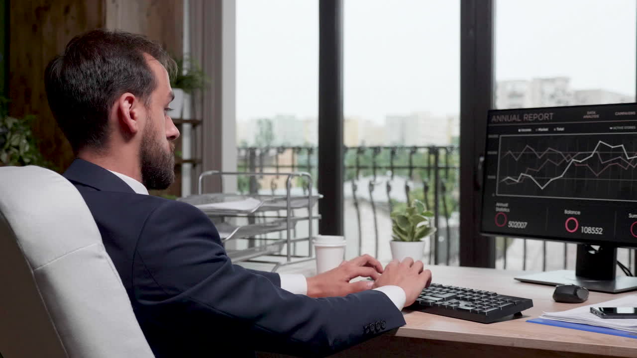 Man working on computer in office