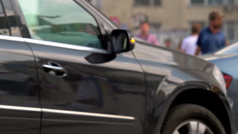 Yuriy-Gyumri,-Armenia---Cars-And-Other-Vehicles-Slowly-Moving-On-The-Street-While-People-Crossing---Close-up-Shot