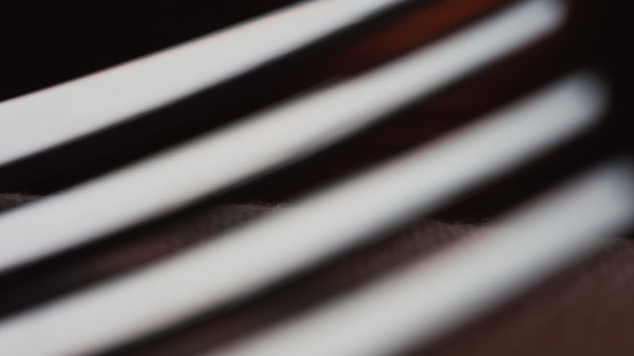 Close up of fork tines with soft reflections