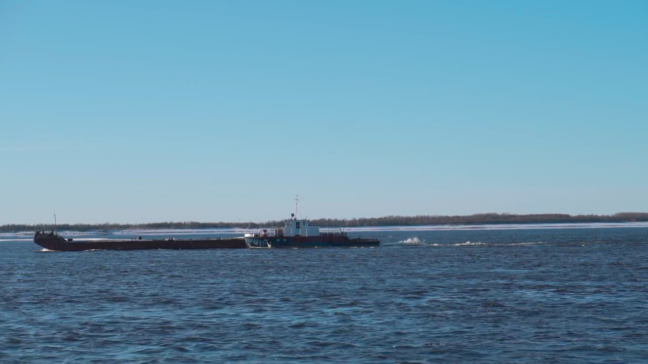 River Transport Scene with Barge and Tugboat