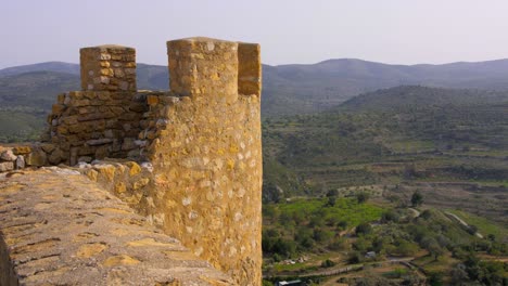 Static-view-of-remains-of-an-old-medieval-castle-tower-of-a-hill-in-Cervera-del-Maestre,-Castellon-province,-Spain