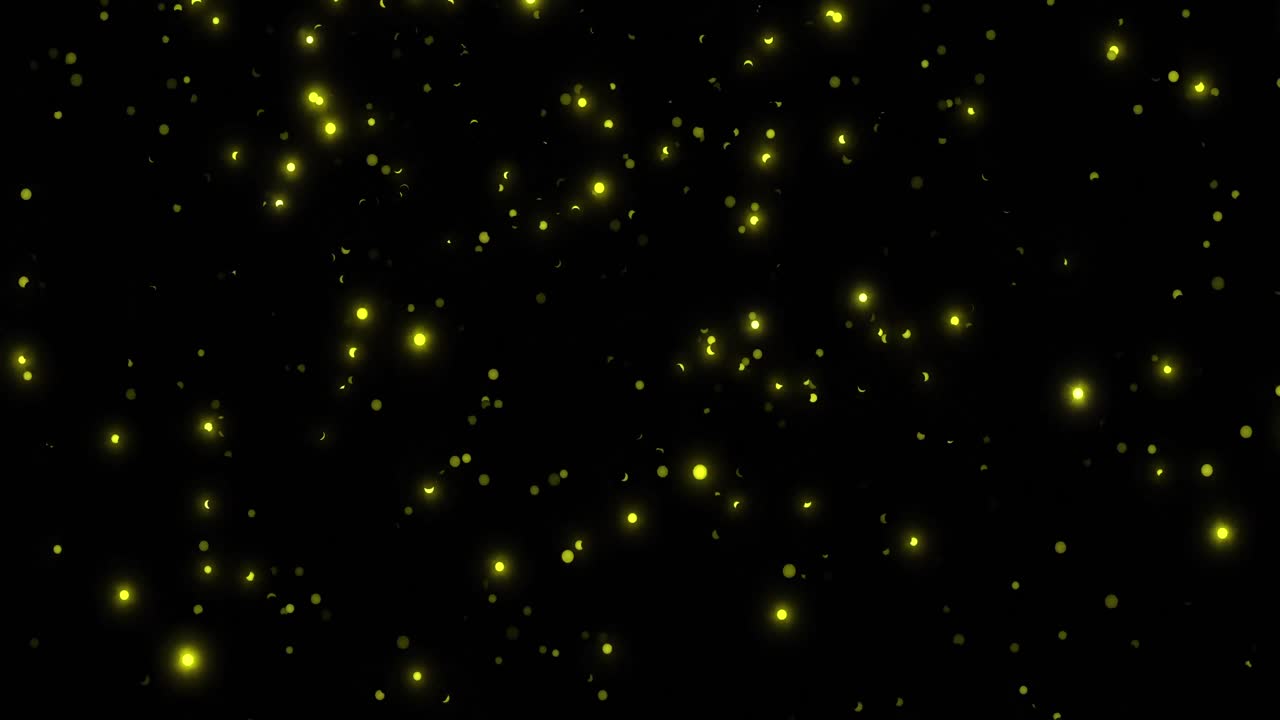 Animazione di punti gialli luminosi che cadono su sfondo nero