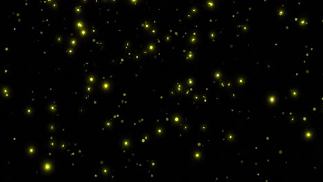 animation of glowing yellow spots falling on black background