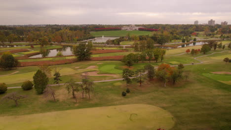 aerial of forest park golf course with the saint louis art museum on the horizon on a pretty day in autumn