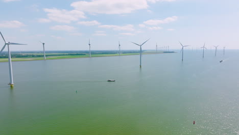 passenger ship moving toward offshore wind farm
