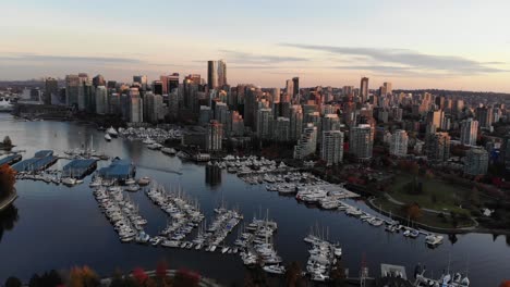 right-sweep-aerial-pan-of-vancouver-downtown-stanley-park-golden-hour