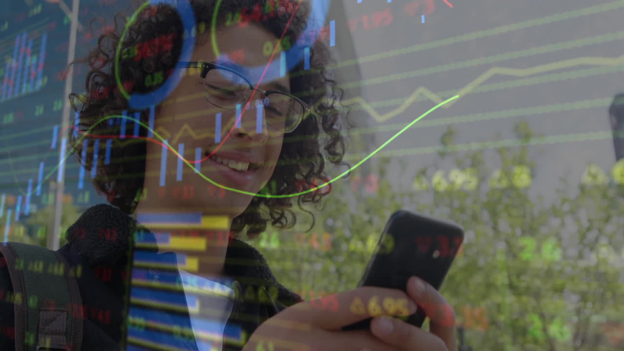 Using smartphone, person analyzing financial graphs with animation overlay in school