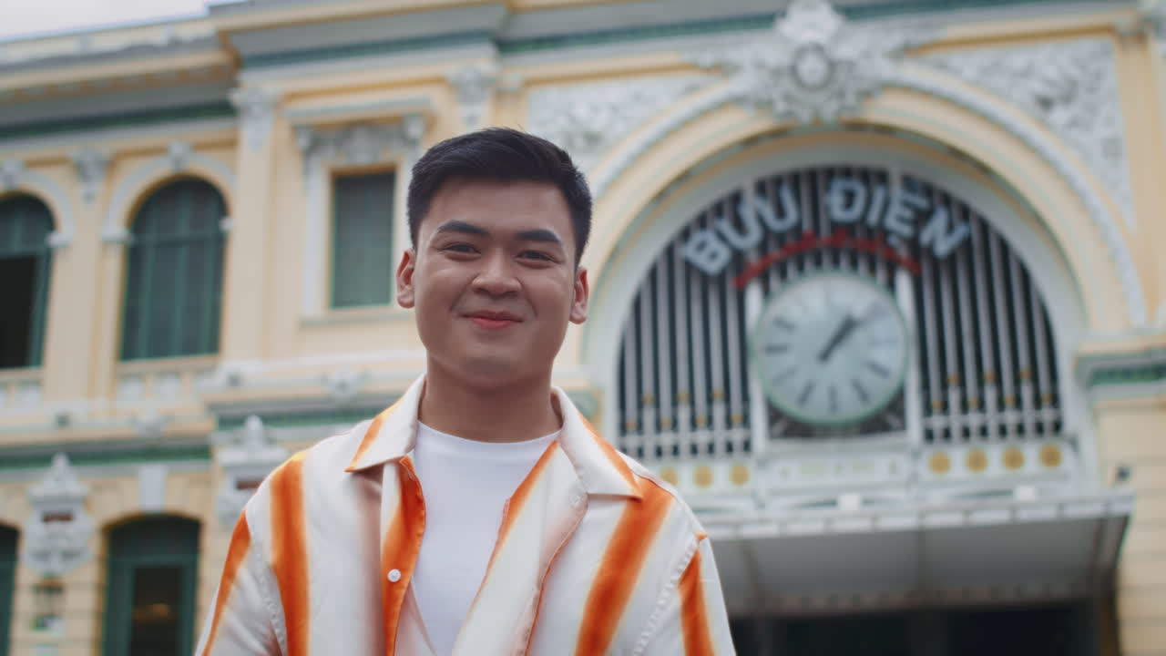Portrait of Young Asian Man in City Center