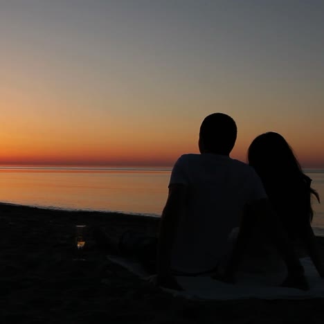 couple sitting on beach