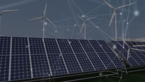 Animation-of-network-of-connections-over-solar-panels-and-wind-turbines