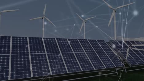 animation of network of connections over solar panels and wind turbines