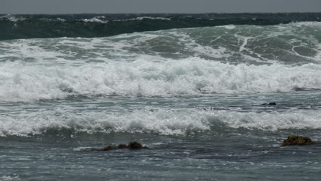 incoming tidal waves off the south coast of cornwall, england.