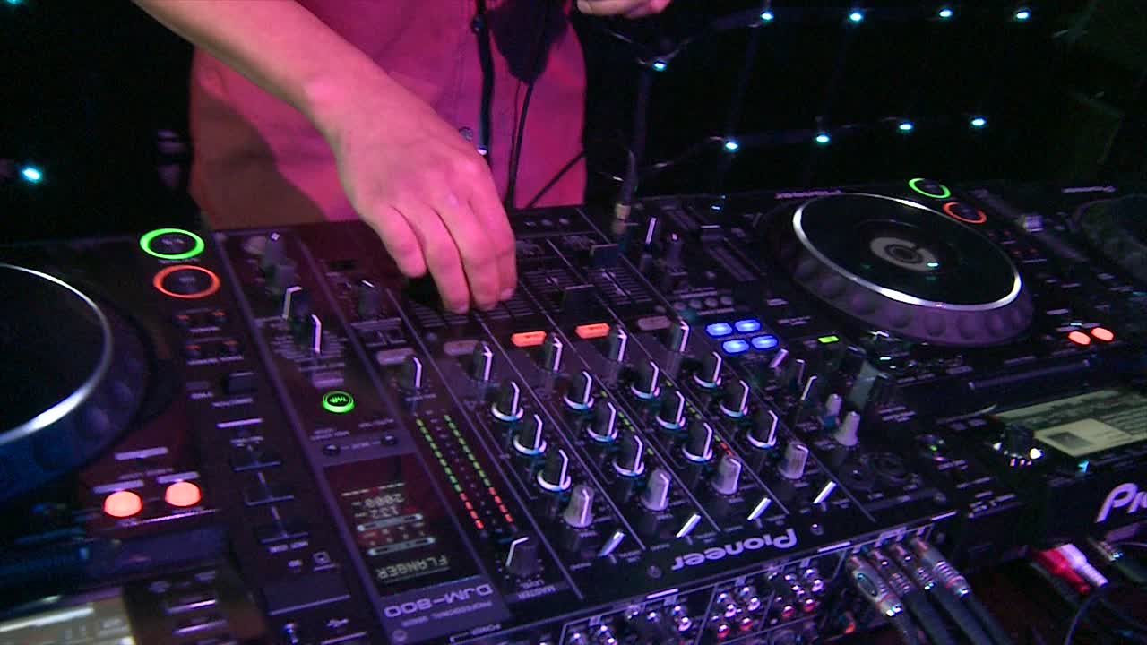 DJ Performing at a Nightclub