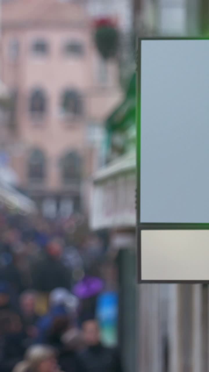 City street scene with crowd and signage