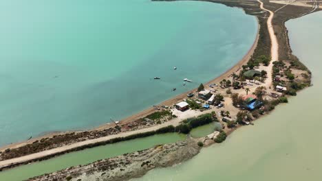 aerial view of serene coastal landscape, turquoise waters, serene mood