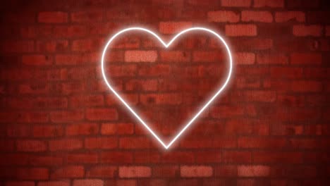 Animation-of-glowing-neon-heart-icon-on-brick-wall