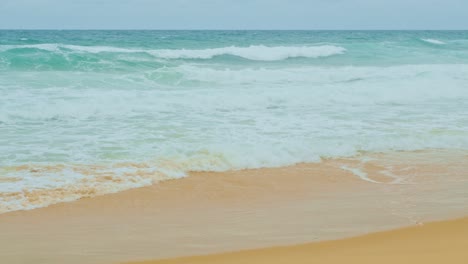 sea waves seamless loop on the white phuket sand beach