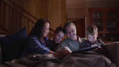 family spending time together at home in the evening