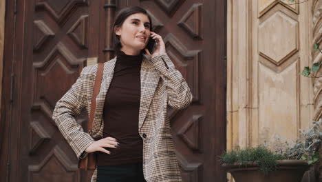 Caucasian-businesswoman-waiting-taxi-outdoor.