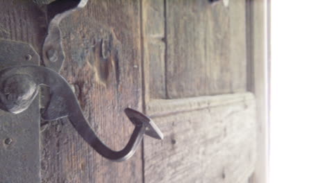 intense light from the other side of an old door