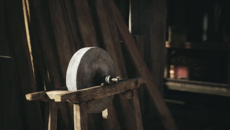 close-up of an old stone grinding wheel