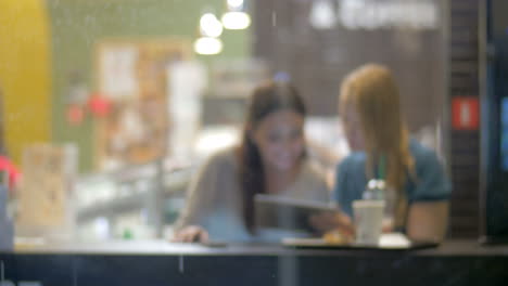 They-have-nice-time-in-cafe-while-it-raining-outside