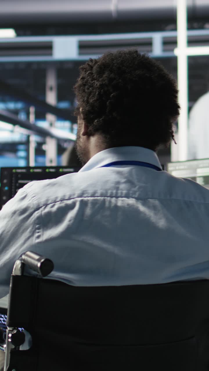 Vertical Video Server Room Programmer With Paraplegia Interprets Ai Data Analytics Graphs