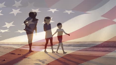 Animation-of-flag-of-usa-over-african-american-couple-with-son-and-daughter-on-beach