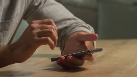 Caucasian-man-using-his-phone