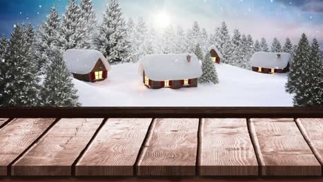 Animation-of-snow-falling-over-houses-in-winter-landscape-seen-through-window