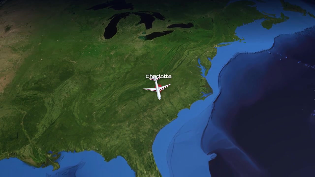 Satellite view animation follows a commercial airplane flying from Singapore to Charlotte, North Carolina