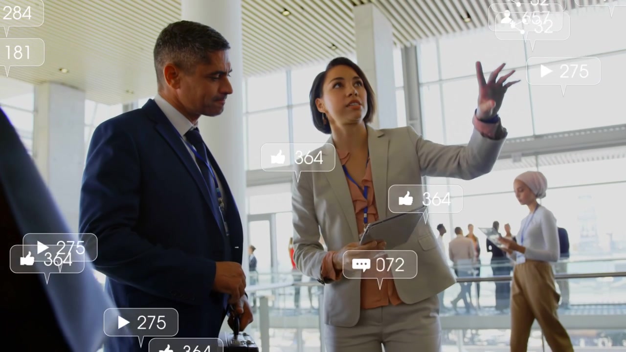 Woman showing metrics, tapping tablet and moving AR counts at conference, red walker blocking view