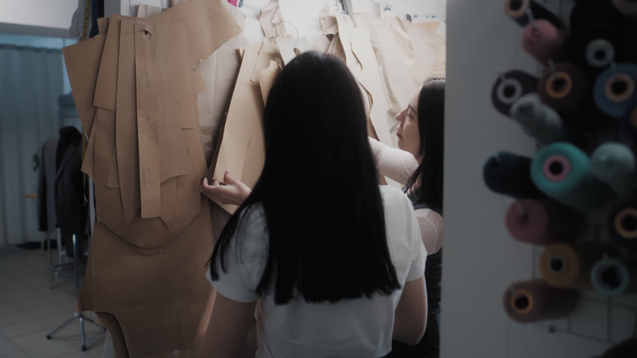 Fashion Designers Working on Patterns