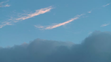 evening clouds slowly moving across the sky
