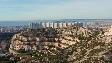 flying over super rouvière residence and revealing marseille city in france