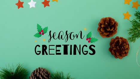 Animation-of-seasons-greetings-christmas-text-and-decorations-on-green-background