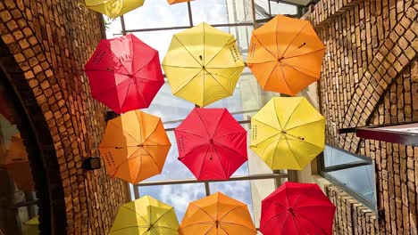 vibrant umbrellas hanging in camden market, london