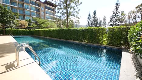 Peaceful-and-Sunny-Swimming-Pool-Area