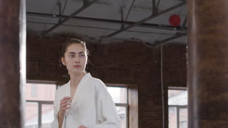 young woman doing martial arts