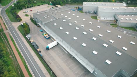 warehouse storages or industrial factory or logistics center from above