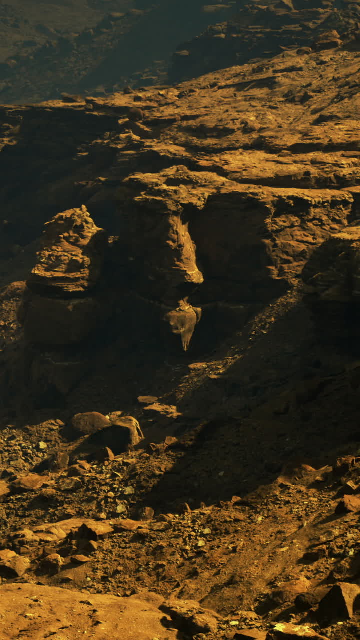 Rocky landscape with rugged terrain and hills at golden hour