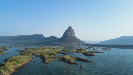 breathtaking drone shot of karamchat dam, with the beautiful river flowing beneath the dam's walls.