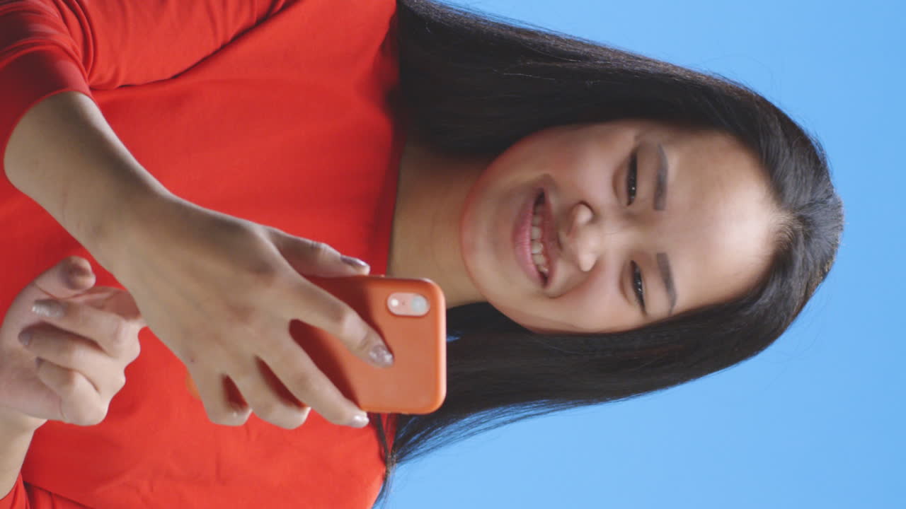 Woman looking at mobile phone