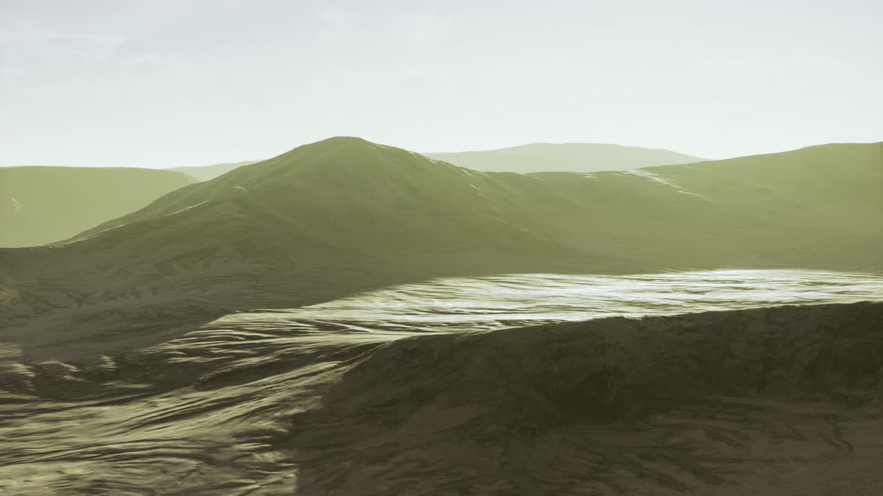 Expansive landscape with rolling hills under soft sunlight in tranquil setting