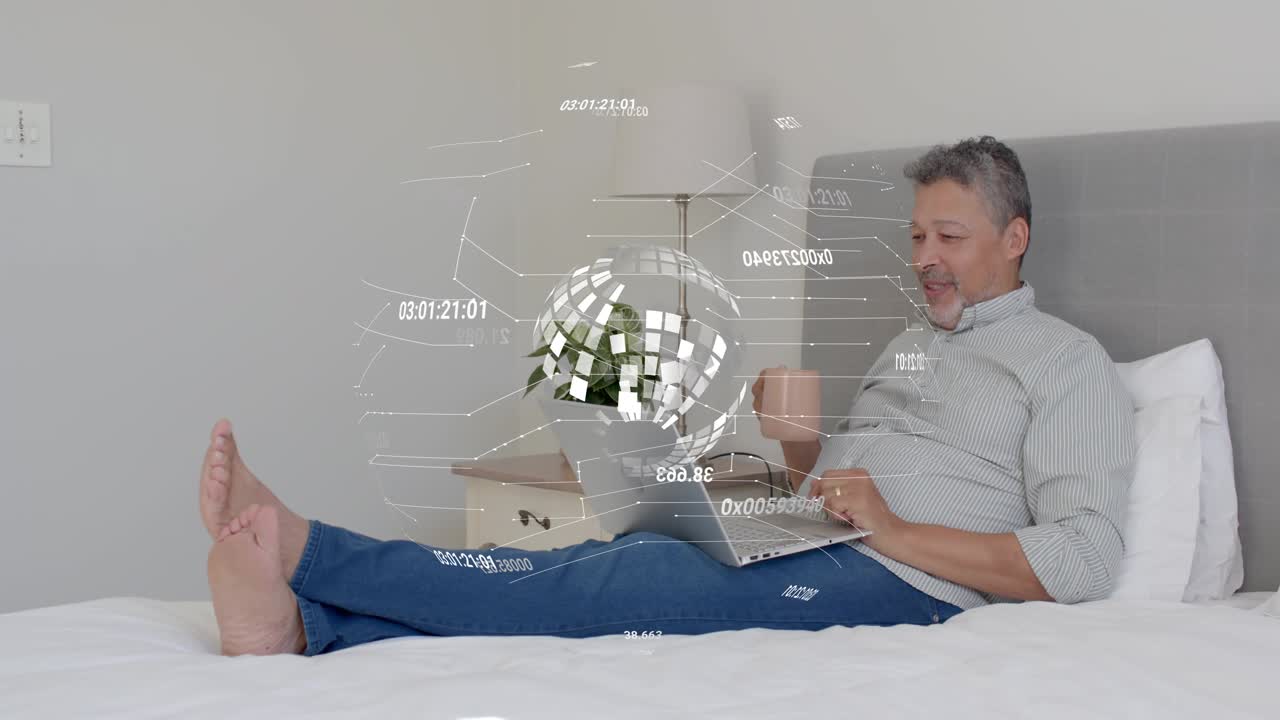 Man in bed opening laptop, typing holding mug, AR overlay hovering over torso analyzing tech data